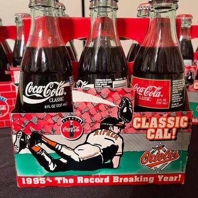 (3) sets of vintage coke bottles for the orioles 