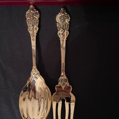 F.B. Rogers plated gold flatware set with case.