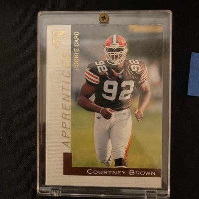 Tuff Stuff Jr. 1991 magazine, Courtney Brown Rookie card, 1990 Topps football cards, 2011 Topps NFL trading cards.
