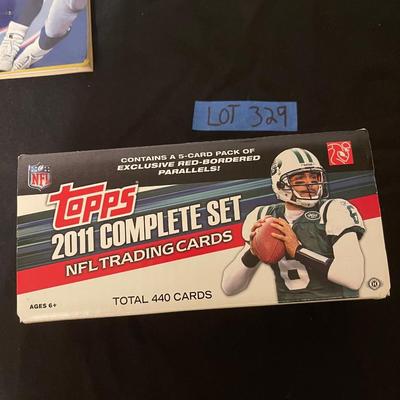 Tuff Stuff Jr. 1991 magazine, Courtney Brown Rookie card, 1990 Topps football cards, 2011 Topps NFL trading cards.
