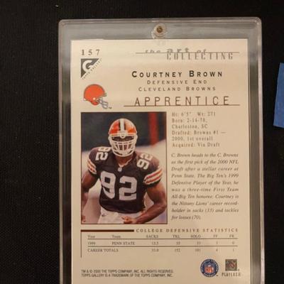 Tuff Stuff Jr. 1991 magazine, Courtney Brown Rookie card, 1990 Topps football cards, 2011 Topps NFL trading cards.