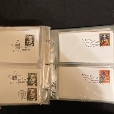(24) pages of first day Stamps