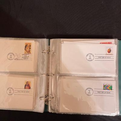 (24) pages of first day Stamps