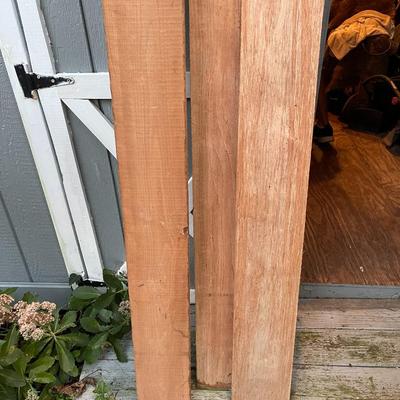 Huge wood board lot & (2) 24ft ladders 