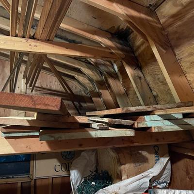 Huge wood board lot & (2) 24ft ladders 