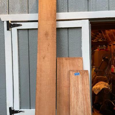 Huge wood board lot & (2) 24ft ladders 
