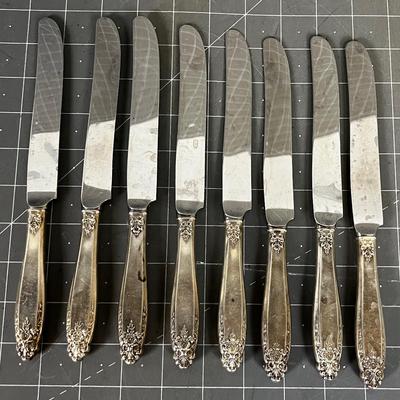 8- Sterling Handled Dinner Knives 