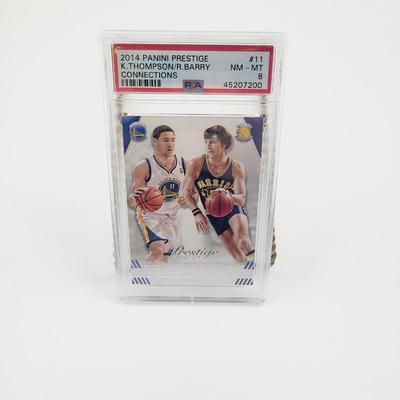 PSA 2014 PANINI PRESTIGE K. THOMPSON / R. BARRY CONNECTIONS NM-MT PROTECTED CARD