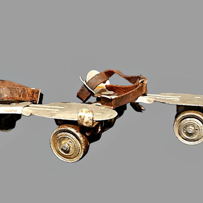 Vintage Metal Rollerskates with Key