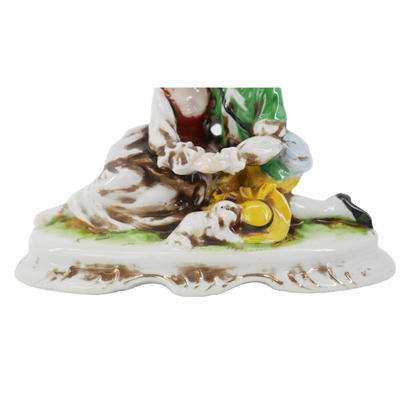 Couple with Dog Figurine