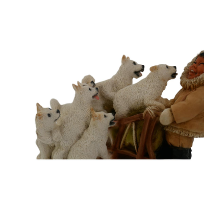 Vintage Laughing Eskimo with Dogs Figurine 