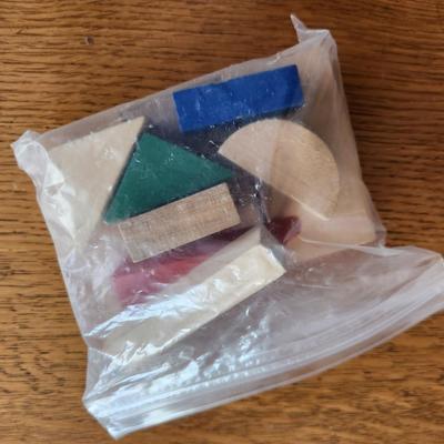 Small Plastic Bag of Wood Building Pieces