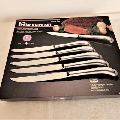 Lot #32  Boxed Set of Oyster Bay Steak Knives - set of 8