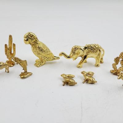SMALL GOLD TONED METAL MINATURE FIGURINES