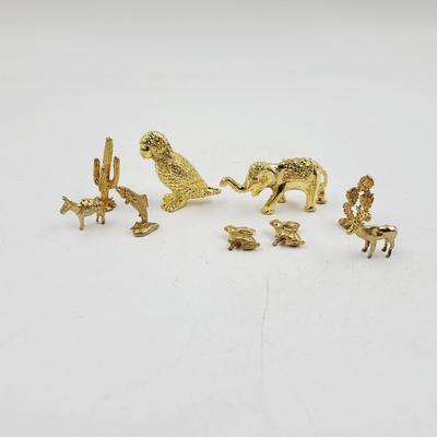 SMALL GOLD TONED METAL MINATURE FIGURINES