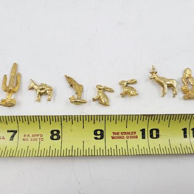 SMALL GOLD TONED METAL MINATURE FIGURINES