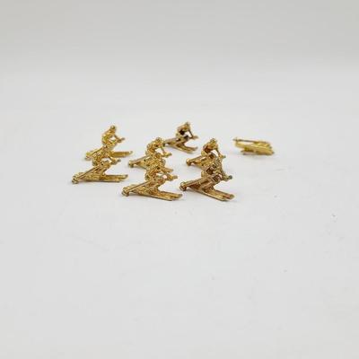SMALL GOLD TONED SKI MINATURES