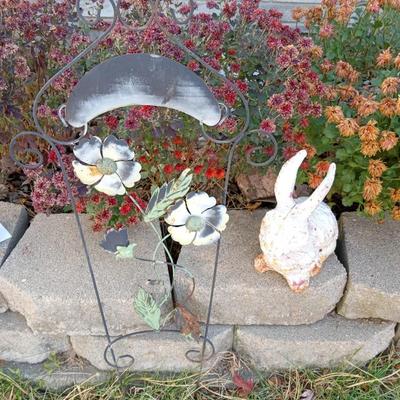 CAST IRON RABBIT AND A STAKED METAL FLOWERS
