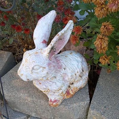 CAST IRON RABBIT AND A STAKED METAL FLOWERS