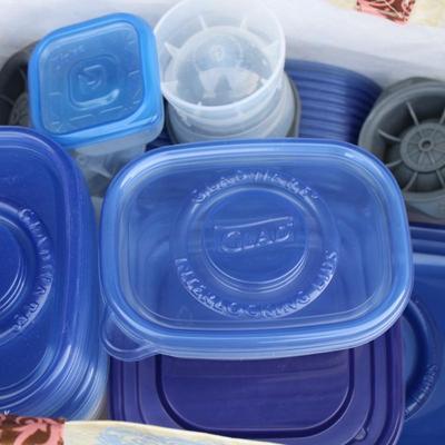 Large set of Tupperware and reusable shopping bag