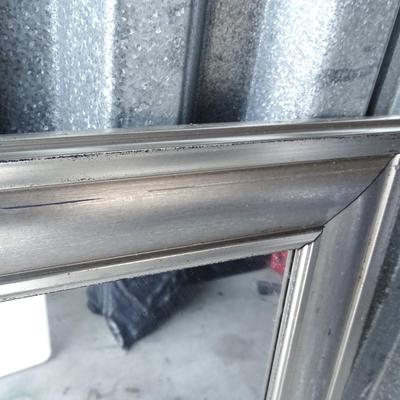 Full length mirror. General wear and tear. Backing ripped.
