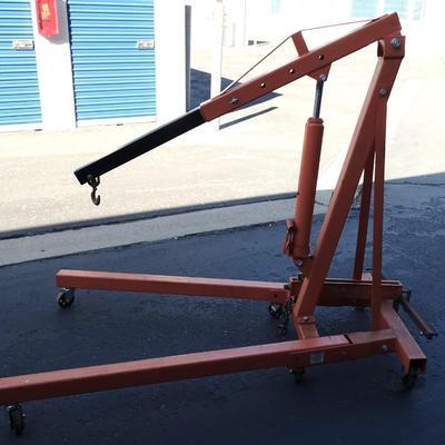 Folding Engine hoist with swivel hook, extra large wheels, newer ram, modifications for extension of arm, Harbor Freight sourced...