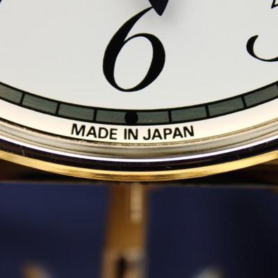 Glass encased clock. Plastic. Made in Japan. And Small Crystal Melody Quartz Hygrometer and clock