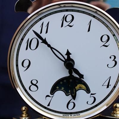 Glass encased clock. Plastic. Made in Japan. And Small Crystal Melody Quartz Hygrometer and clock