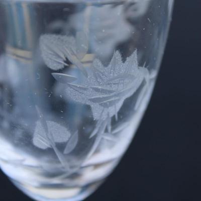 Set of 4 crystal engraved sherry glasses.