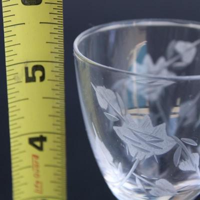 Set of 4 crystal engraved sherry glasses.