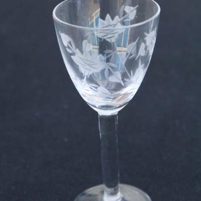 Set of 4 crystal engraved sherry glasses.