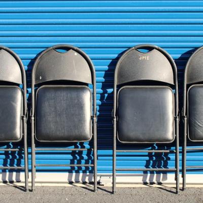 Four Costco folding chairs