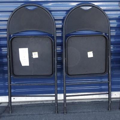Four Costco folding chairs