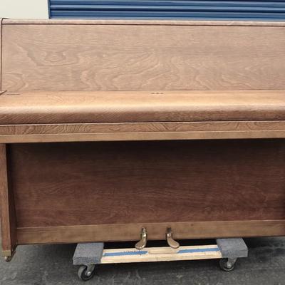 Eterna upright piano; minor wear and tear