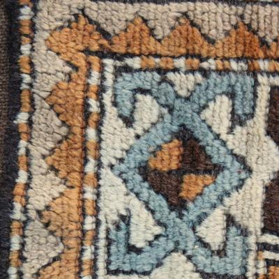 Denim blue, rust and ivory Turkish wool rug; machine made