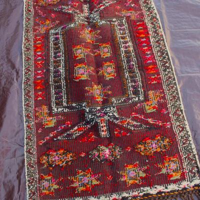 Very old hand made Turkish rug.  Can be hung as a tapestry.