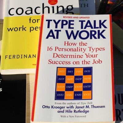 Assortment of books including the Meyers Briggs personality indicator