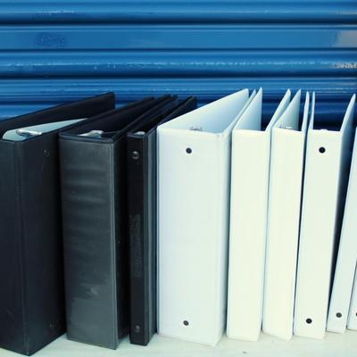 Large bundle of office supplies; binders, Eddie Bauer briefcase binder, labels, clips and markers