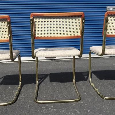 Vintage glass top table with brass legs, 3 chairs included