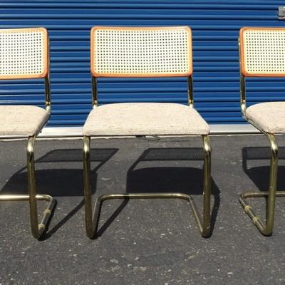 Vintage glass top table with brass legs, 3 chairs included