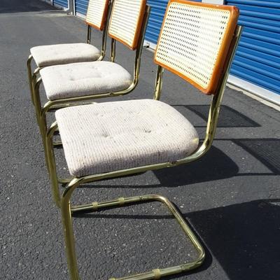 Vintage glass top table with brass legs, 3 chairs included