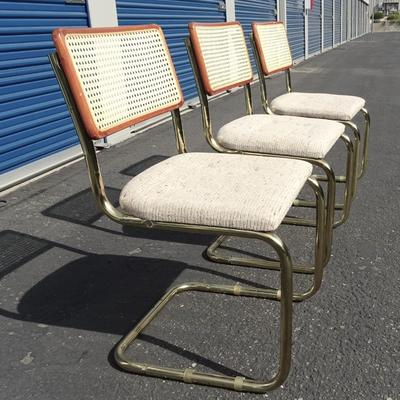 Vintage glass top table with brass legs, 3 chairs included