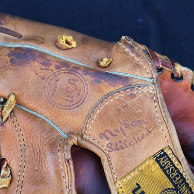 Wilson baseball mitt and four decks of playing cards