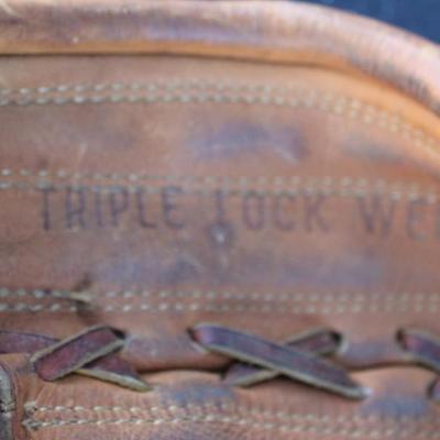 Wilson baseball mitt and four decks of playing cards