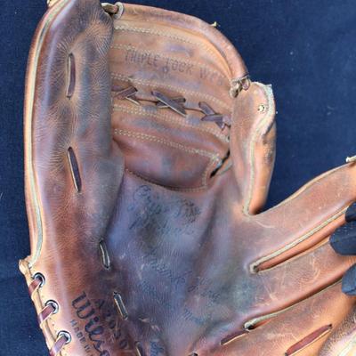 Wilson baseball mitt and four decks of playing cards