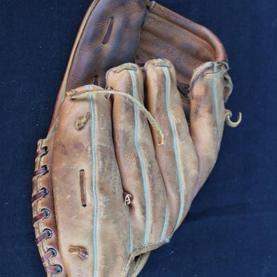 Wilson baseball mitt and four decks of playing cards