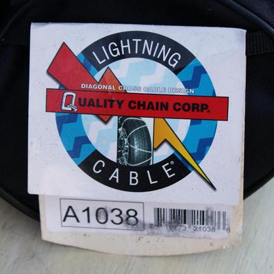 Blitz 5 gallon gasoline jug and Quality Chain Corp lightning cable snow chains