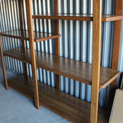 Mid Century Modern entertainment center with adjustable shelving.