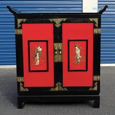 Red and Black Chinoiserie, Lacquered, Carved and Painted cabinet  by Cathay Arts company. Some wear and tear.