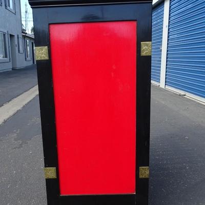 Red and Black Chinoiserie, Lacquered, Carved and Painted cabinet  by Cathay Arts company. Some wear and tear.